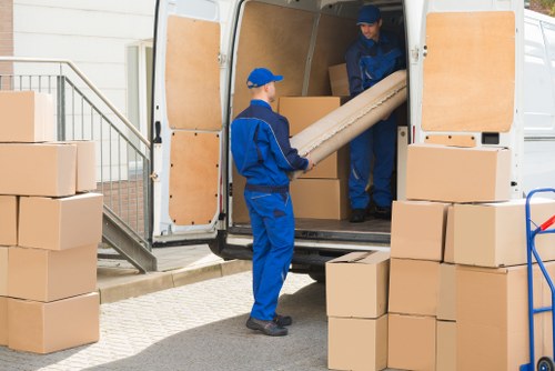 Man And Van Hammersmith team handling a move safely with protective equipment