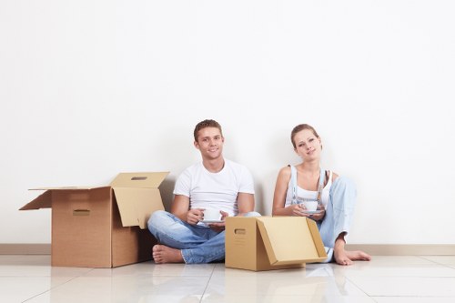 Professional packing materials and labelled moving boxes in a Hammersmith home