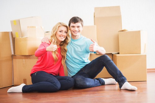Boxes and furniture being loaded for a residential move in West London